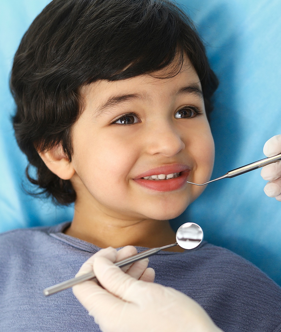 Little boy smiling at dentist