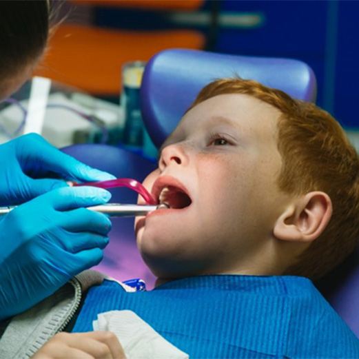 a child patient undergoing emergency dentistry in Papillion