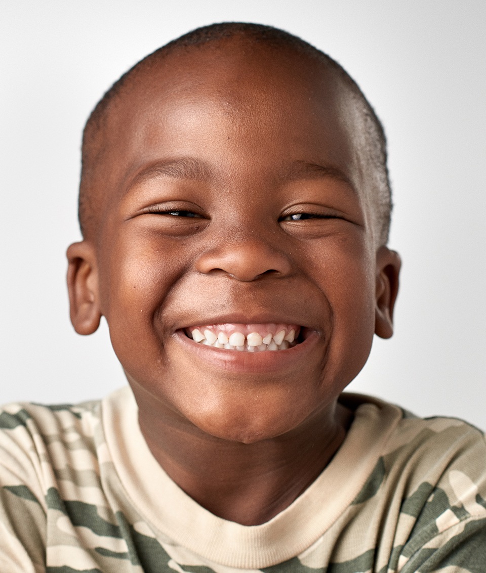 closeup of young boy smiling