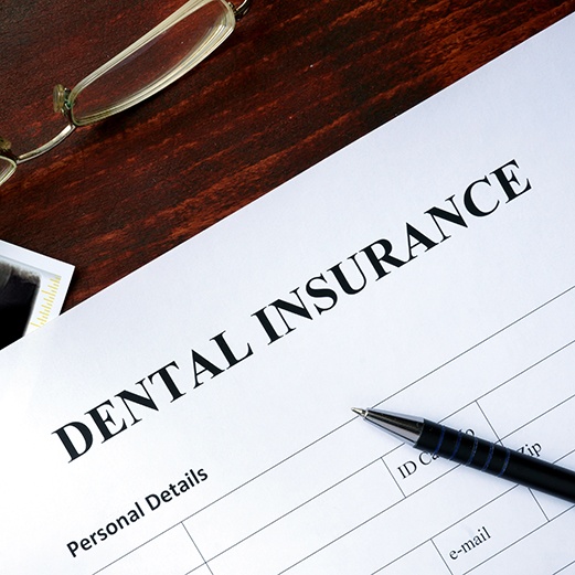 dental insurance form on table